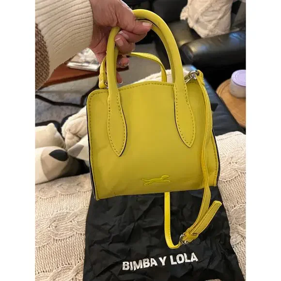 Bimba Y Lola Small Crossbody Bag in Yellow with a Black trim✨ - Picture 9 of 10